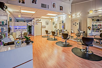 Spacious and stylish hair salon interior in Del Mar, CA showcasing chic design. HD wallpaper