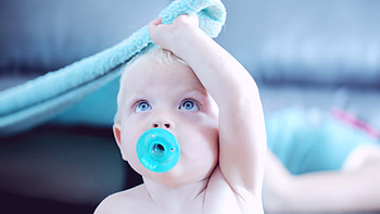 Blue Eyes Baby Toddler With Pacifier In Mouth Is Sitting In Blur Background Cute HD wallpaper