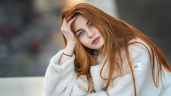 Blonde Redhead Girl Model Is Sitting In Blur Background Wearing White Fur Dress Girls HD wallpaper