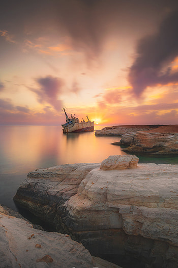 Cyprus nature landscape, Shipwreck view, Rock cliff formation, Clouds over Cyprus HD phone wallpaper