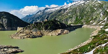 reservoir behind a dam in the alps, dam, clouds, resrvoir, mountains, rocks HD wallpaper