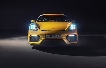 Porsche 718 Cayman GT4, glow, headlights, yellow car HD wallpaper