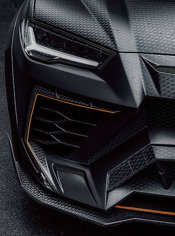 Detailed shot of a luxury sports car's front with carbon texture and sleek design. HD phone wallpaper