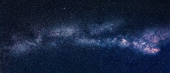 Captivating view of the Milky Way galaxy across a clear starry night sky. HD wallpaper