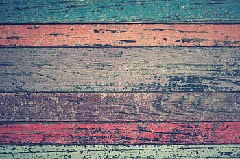 Vibrant, rustic wooden planks with a worn, weathered texture create a unique design. HD wallpaper