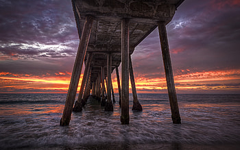 Sunset, sea, sand, colors, beach, waves, bridge, clouds, nature, sky, ocean HD wallpaper