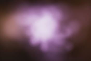 A vibrant abstract background with a blurred purple glow and soft focus effect. HD wallpaper
