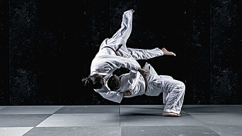 Dynamic Judo action, , Showcasing skill, Intense competition HD wallpaper