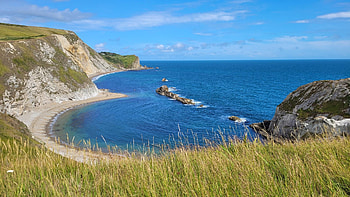 Man O'War beach in England, clouds, sea, sky, coast, grass HD wallpaper