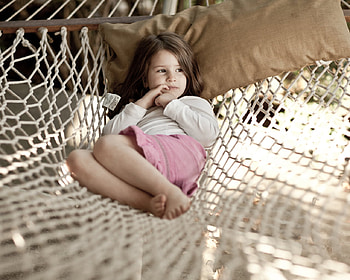 Let me rest, little girl, cute little girl, relax, sunny day, little lady, pillow, lovely face, serious, hammok, thinking, stare, child, sweet baby HD wallpaper