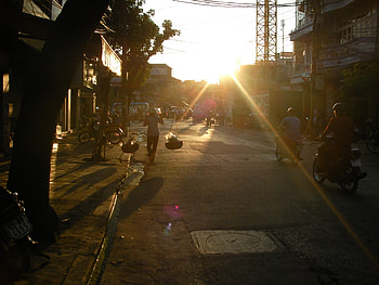 Asian Street Scene, motor cycles, sunrays, light, people, tree HD wallpaper