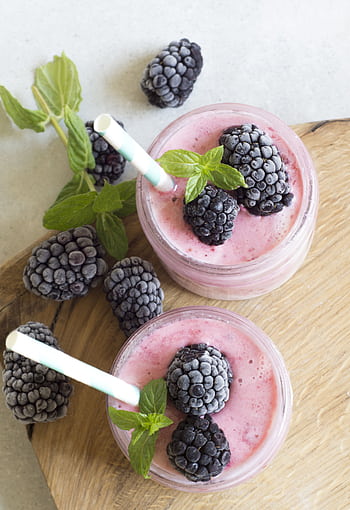Enjoy a refreshing blackberry smoothie topped with fresh mint leaves, perfect for a summer treat. HD phone wallpaper
