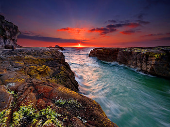 Heaven's gate, colorful, sunrise, shore, sun, ocean, sunset, sea, gate, sundown, rocks, summer, heaven, red, clouds, nature, sky, flowers HD wallpaper