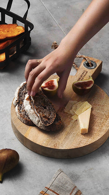 Bread on chopping board, Food videography, Rustic kitchen, Authentic cooking HD phone wallpaper