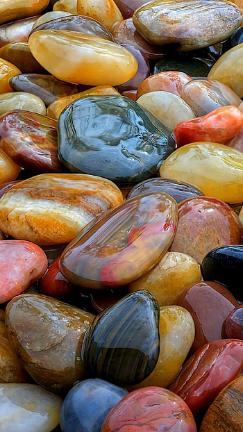 Amber stones, Fossilized resin, Warm hues, Timeless elegance HD phone wallpaper