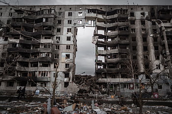 A destroyed apartment building in Borodyanka, Ukraine, showing aftermath of conflict. HD wallpaper