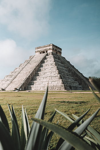 Explore the iconic El Castillo pyramid at Chichen Itza, a remarkable Mayan monument in Mexico. HD phone wallpaper