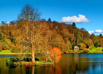 Small cabin on lakeshore, river, lakeshore, shore, reflection, autumn, water, house, fall, lake, cabin, falling, leaves, clouds, nature, sky, cottage, riverbank, foliage HD wallpaper