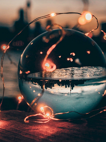 Glass garland, Sunset backdrop, Vibrant colors, Magical ambiance HD phone wallpaper