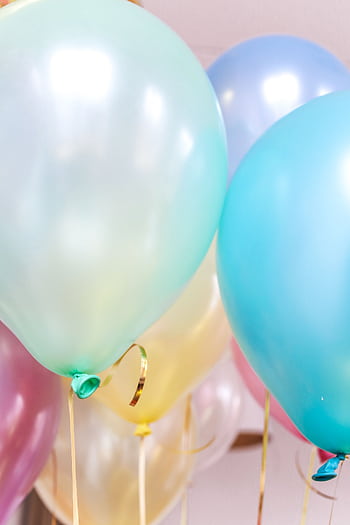 Vibrant and colorful balloons providing a festive and cheerful party atmosphere. HD phone wallpaper