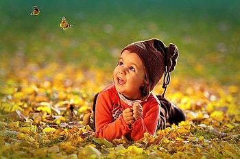 Joy of nature, butterflies, leaves, childhood, smile, nature, child HD wallpaper