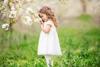 Little Cute Girl Smelling Flowers, little-girl, cute, children, flowers HD wallpaper