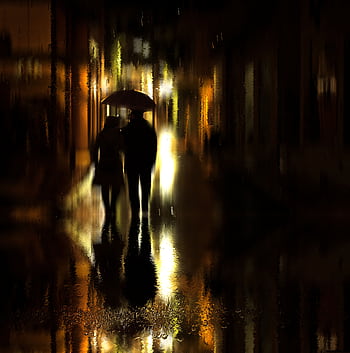 A couple with an umbrella walks on a rainy night street, reflecting street lights in abstract silhouette. HD phone wallpaper
