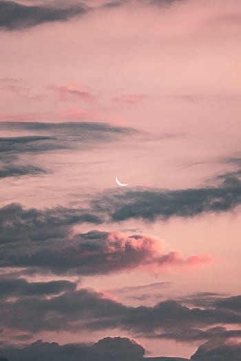 Soft pink and gray evening sky featuring a crescent moon and scattered clouds. HD phone wallpaper