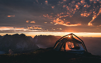 A tent sitting above some coastal mountains at sunrise, morning, grand, seashore, gold, mountain, sunrise, clouds, capming, tent, sun, mountains HD wallpaper