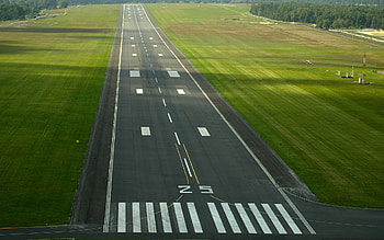 Elevated runway, Aircraft takeoff, Scenic beauty, Urban skyline HD wallpaper