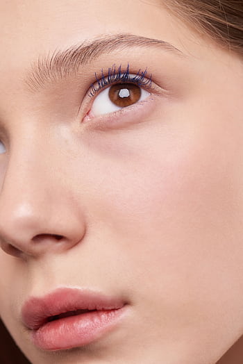 Close-up view of a woman's eye emphasizing natural beauty and skincare. HD phone wallpaper