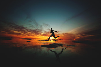 Sunset, silhouette, beach, jump, fun HD wallpaper