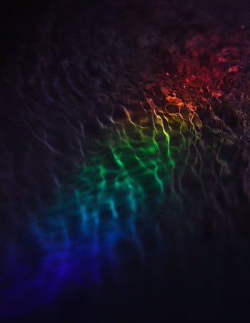 Vibrant rainbow light reflections creating an abstract art pattern. HD phone wallpaper
