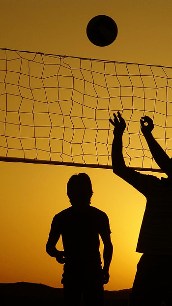 Beach Volleyball, Dynamic gameplay moments, High-quality visuals, Energetic atmosphere HD phone wallpaper
