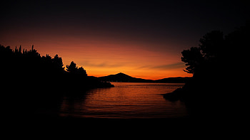 sunset, Nature, Silhouette, Trees, Water, Calm, Dark, Orange, Hill / and Mobile Backgrounds HD wallpaper