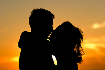 Romantic sunset kiss, Beach romance, Intimate embrace, Love's warmth HD wallpaper
