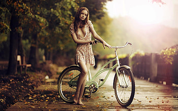 Girl On A Bike In Sunrise HD wallpaper