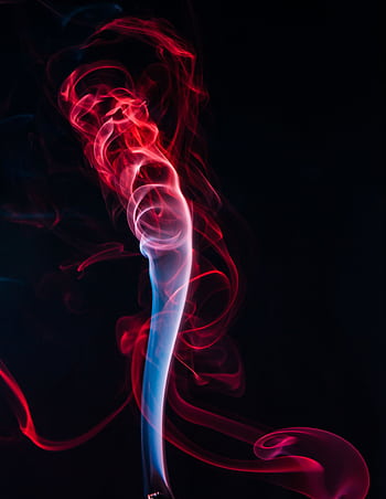 Mesmerizing abstract art showing vibrant red and blue swirling smoke against a dark background. HD phone wallpaper