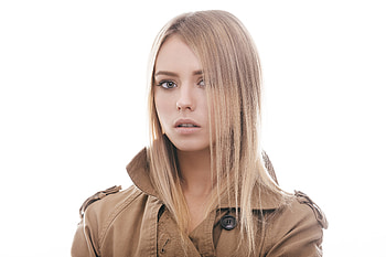 Blonde, hair on face, girl model, coat HD wallpaper