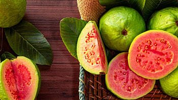 Guava health benefits, Nutrient-rich fruit, Immune-boosting properties, Wellness promotion HD wallpaper