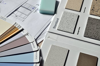 Color palette and material samples for interior renovation projects on a blueprint. HD wallpaper