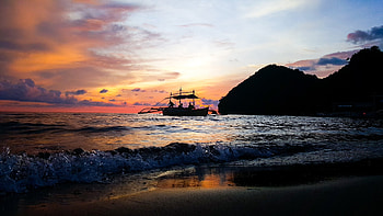 Boat, beach, sunset, sea waves, skyline HD wallpaper