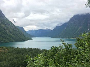Cruising the Norwegian fjords, Serene waterways, Majestic cliffs, Seafarer's paradise HD wallpaper