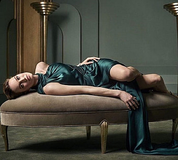 Brie Larson American actrerss, green dress, jewelry, laying on oval bench, brunette HD wallpaper