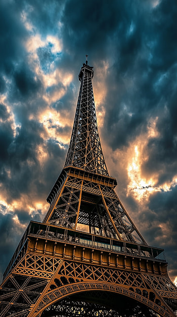 Paris Skyline: Eiffel Tower Under Moody Clouds – Stunning , cloud, Eiffel Tower, Paris HD phone wallpaper