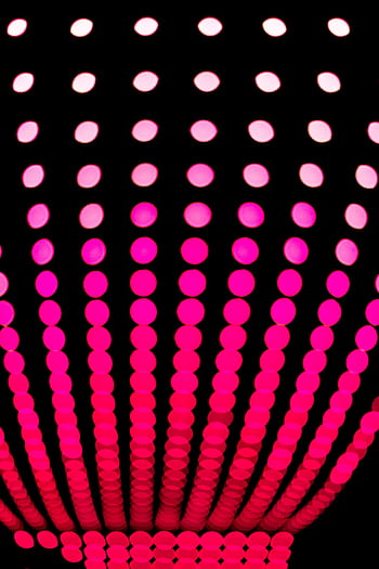Abstract vibrant pink and red polka dot pattern on a dark background. HD phone wallpaper