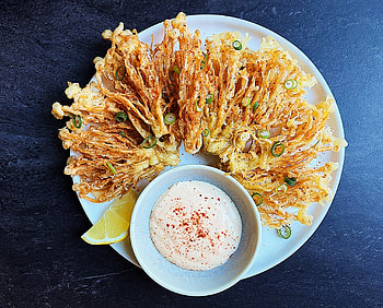 Bloomin onion makeover, Spicy sauce, Vegan-friendly appetizer, Plant-based recipe HD wallpaper