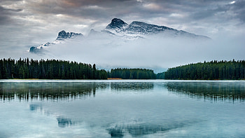 Mountain lake bliss, Tree-lined shores, Majestic backdrop HD wallpaper