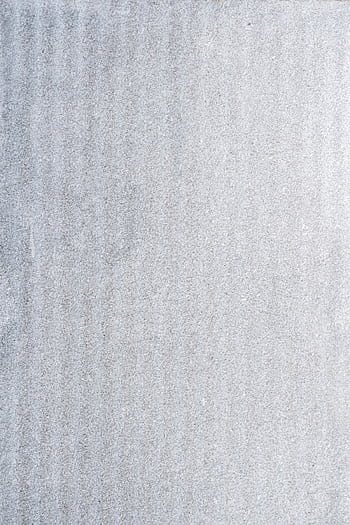 Close-up of a monochrome gray textured surface, ideal for background use. HD phone wallpaper