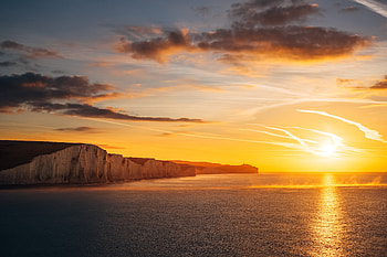 Beautiful Ocean Sunset The Seven Sisters Cliffs , ocean, sunset, nature HD wallpaper